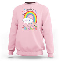 Pre-school teacher sweatshirt in light pink with rainbow and “Tiny Humans” graphic