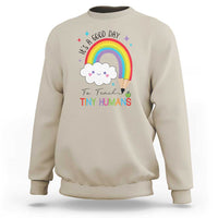 Pre-school teacher sweatshirt in sand with rainbow and “Tiny Humans” graphic