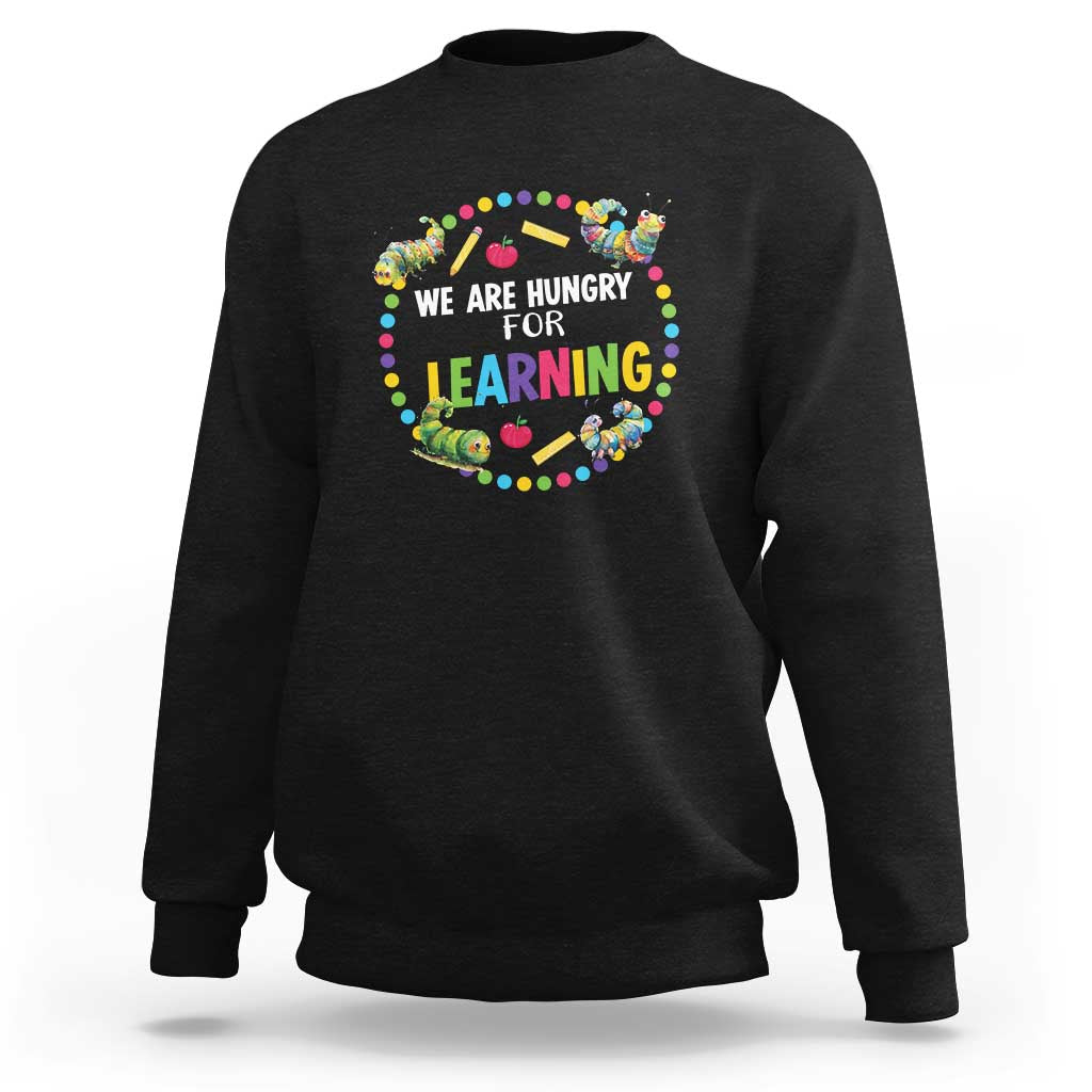 Black pre-school teacher sweatshirt with colorful learning slogan front graphic