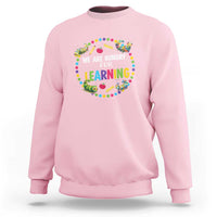 Light pink pre-school teacher sweatshirt with colorful “We Are Hungry for Learning”