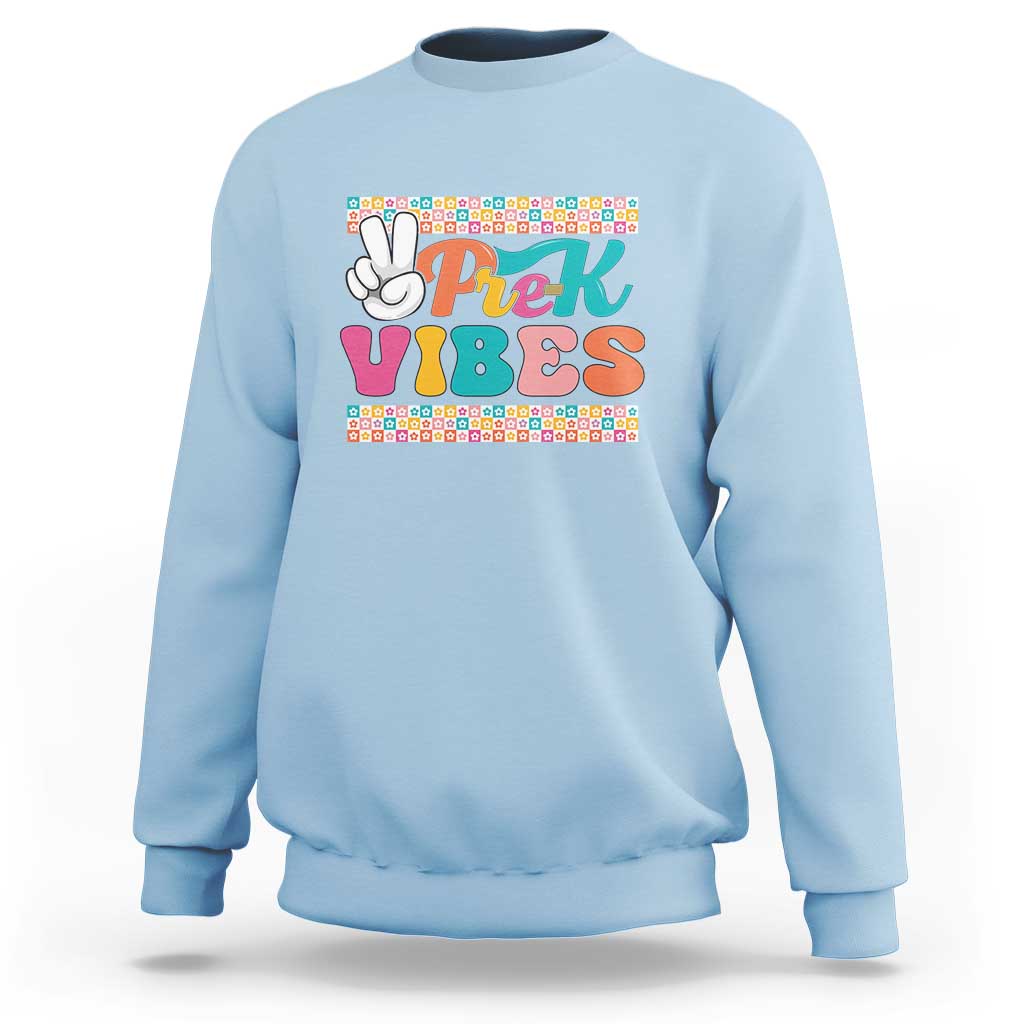 Light blue kids sweatshirt with Pre-k Vibes hand graphic