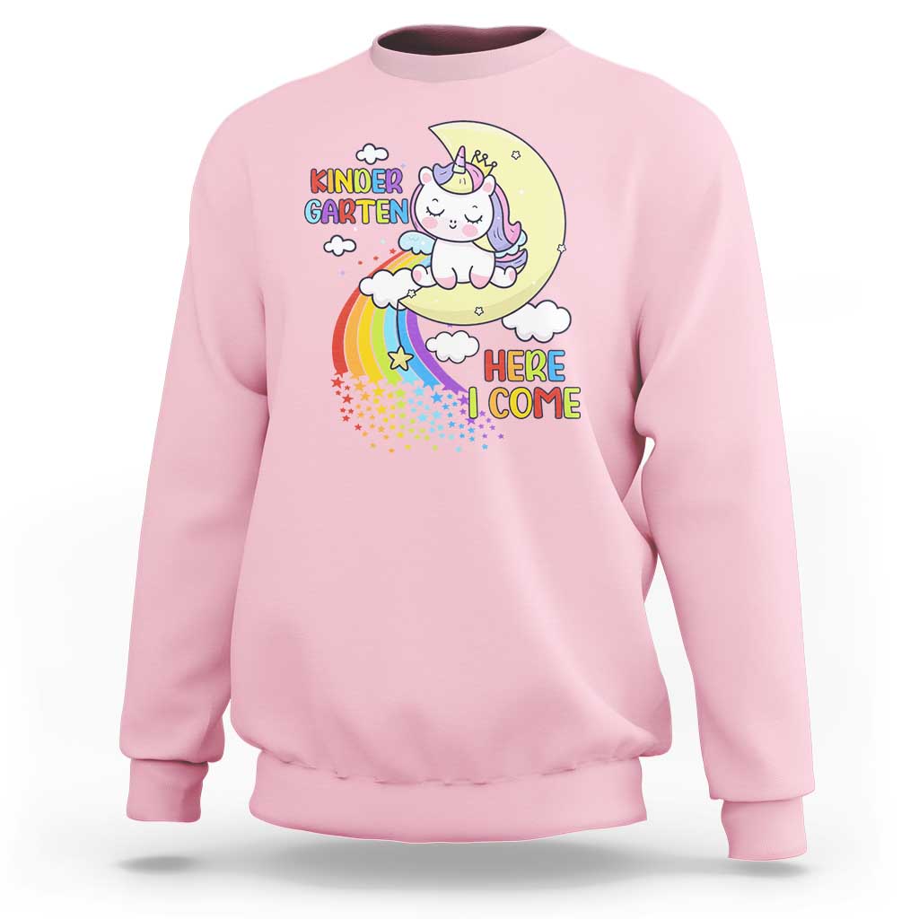 Kids crewneck sweatshirt with unicorn graphic and “Here I Come” text, light pink.