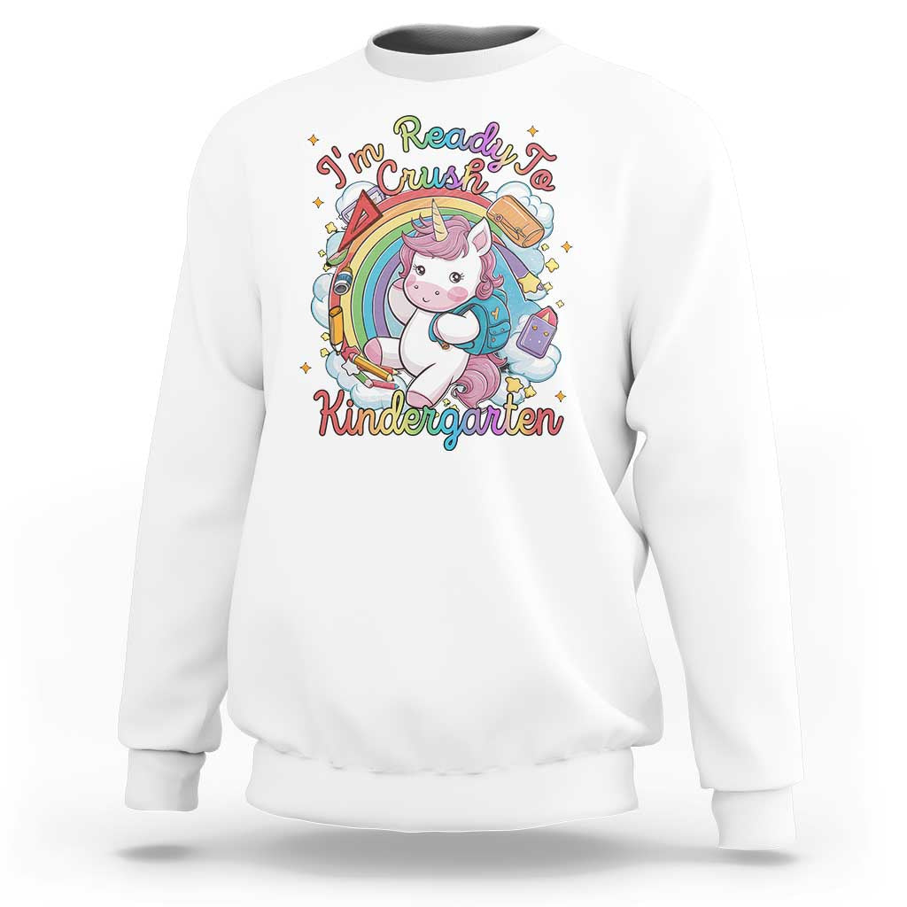 White sweatshirt with rainbow unicorn and “Kindergarten” graphic on front