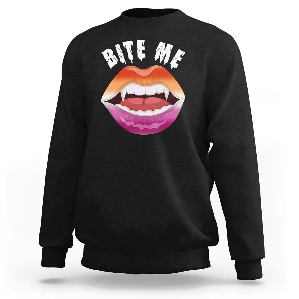 Black crewneck sweatshirt with 'BITE ME' text and colorful mouth graphic on chest