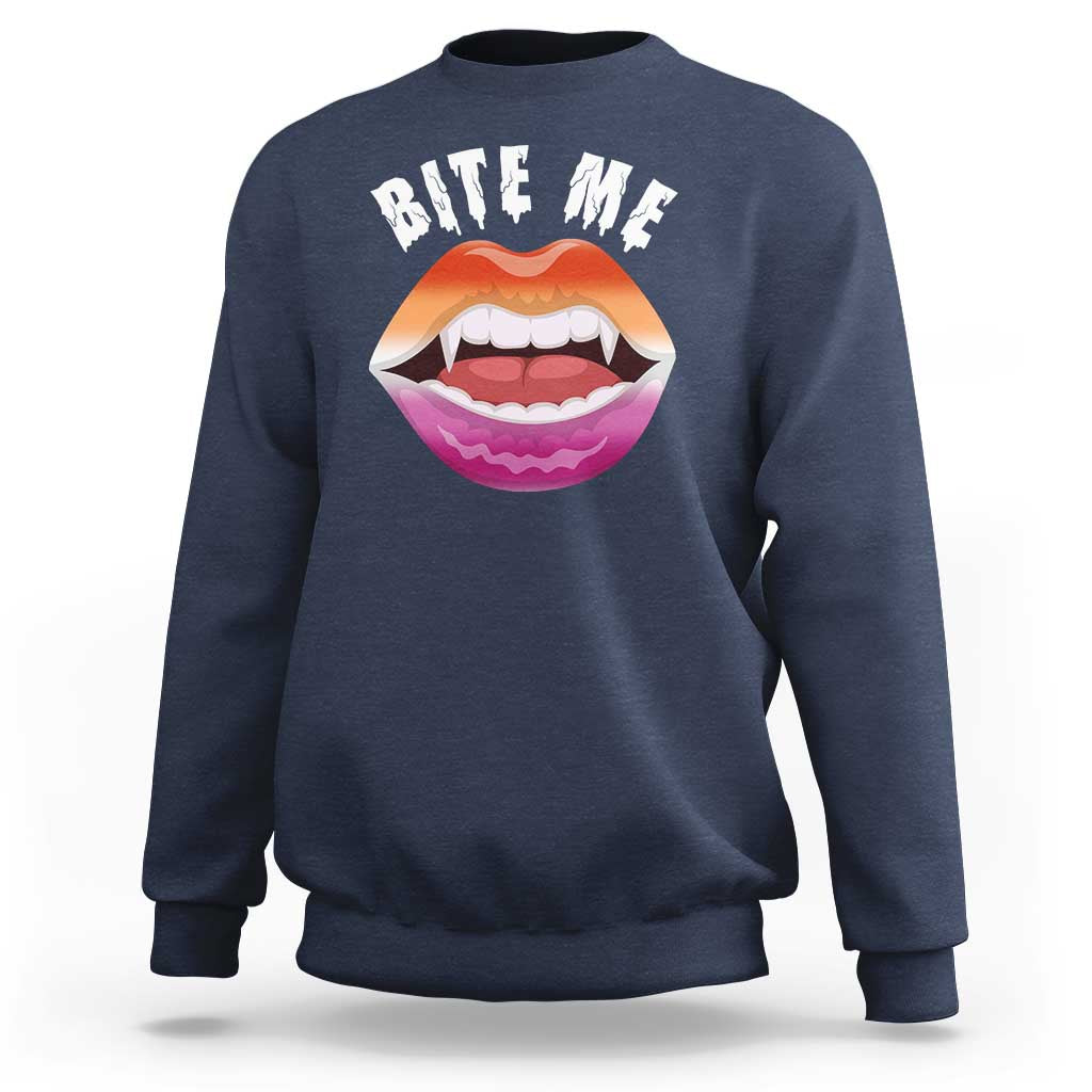 Navy crewneck sweatshirt with 'BITE ME' text and colorful mouth graphic on chest