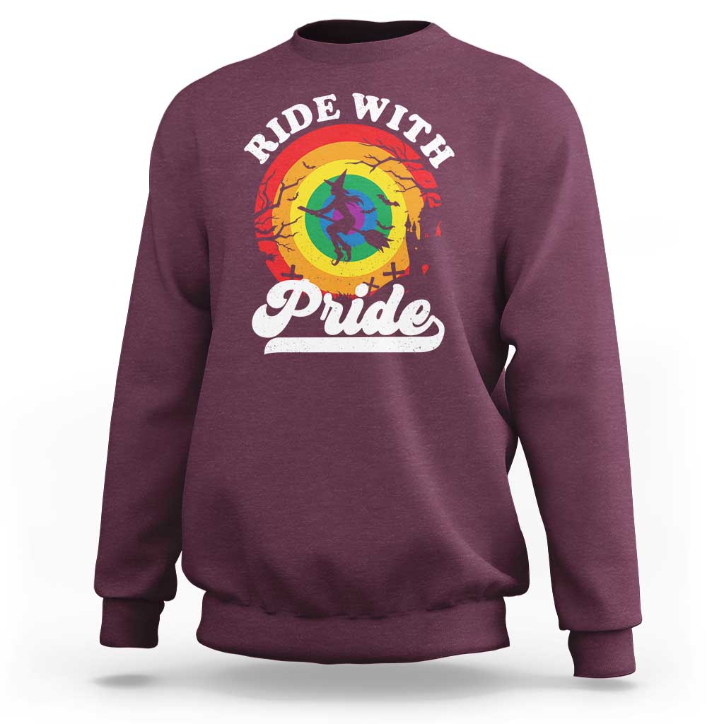 Maroon crewneck sweatshirt with Ride With Pride rainbow witch and Pride graphic