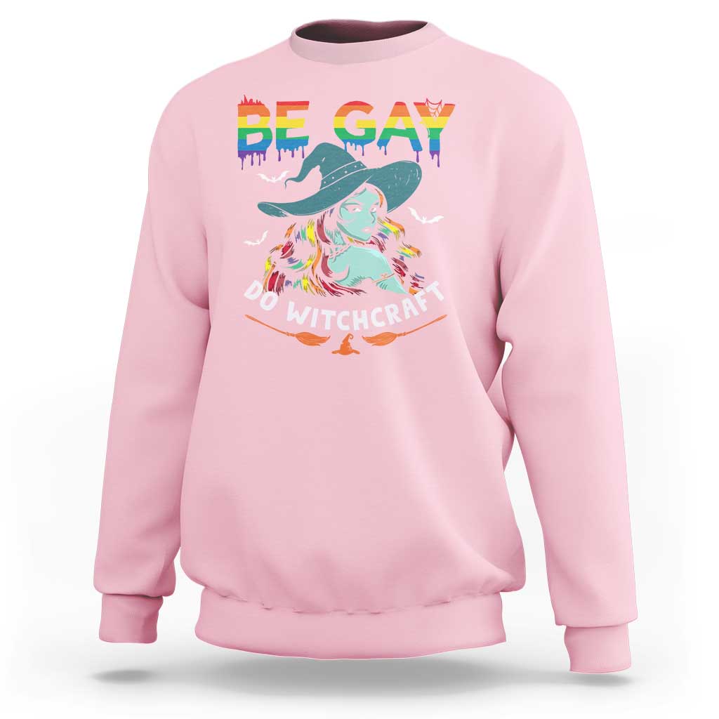 Light pink Halloween LGBT sweatshirt with rainbow “BE GAY” and witch graphic print
