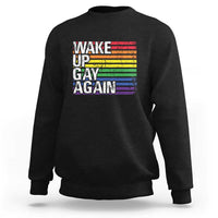 Black crewneck sweatshirt with rainbow "Wake Up Gay Again" graphic on front