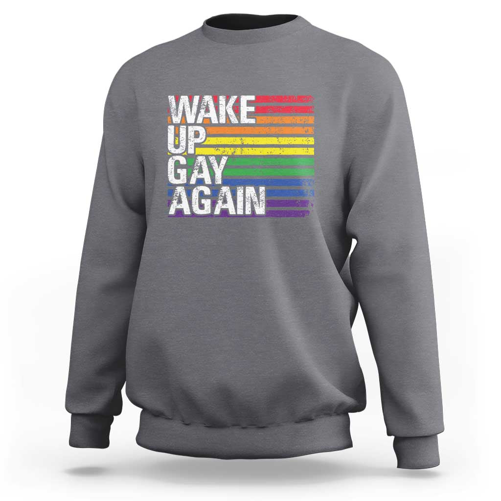 Charcoal crewneck sweatshirt with rainbow "Wake Up Gay Again" graphic on front