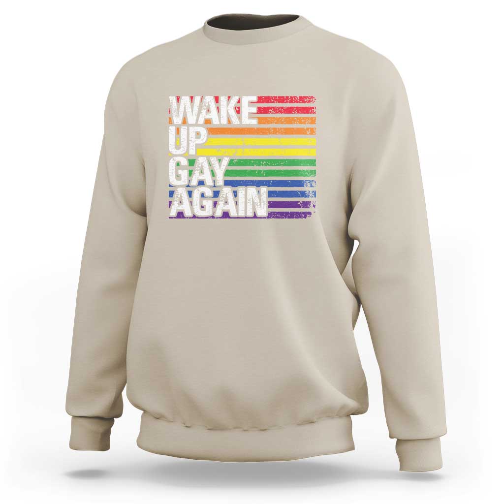 Sand crewneck sweatshirt with rainbow "Wake Up Gay Again" graphic on front