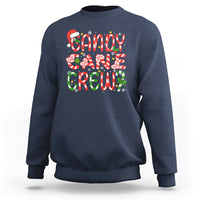 Navy crewneck Christmas sweatshirt with colorful “Candy Cane Crew” graphic on chest