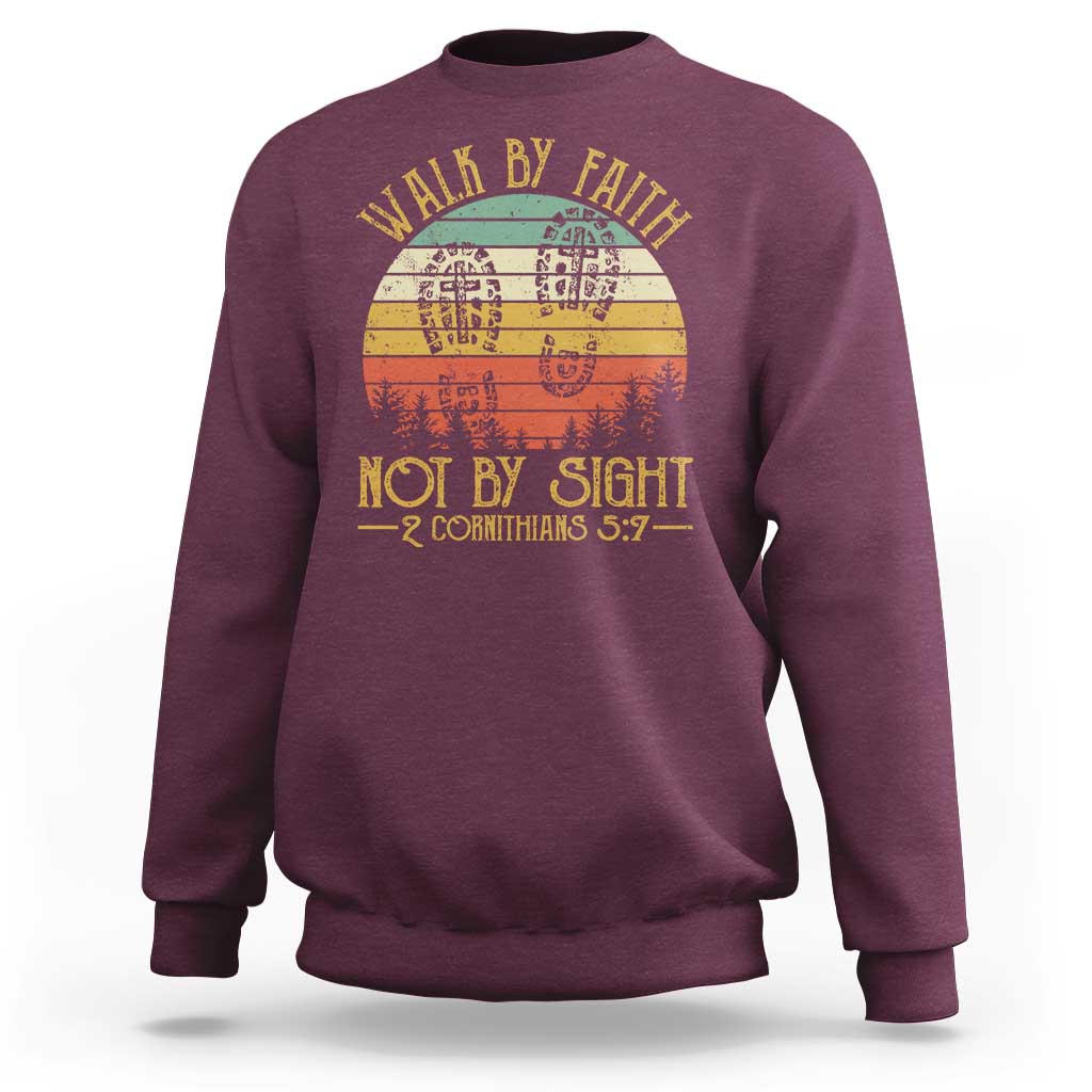 Maroon crewneck sweatshirt with “Walk by Faith Not by Sight” graphic, 2 Cor 5:7.