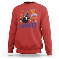Red sweatshirt with cat graphic and “WHAT?” text, long sleeves, crew neck