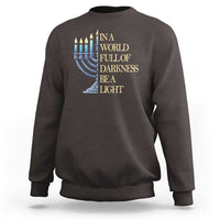 Dark chocolate Hanukkah sweatshirt with blue menorah and 'Be a Light' text graphic