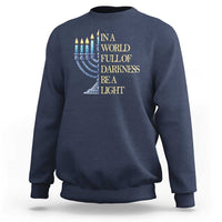 Navy Hanukkah sweatshirt with blue menorah and 'Be a Light' text graphic