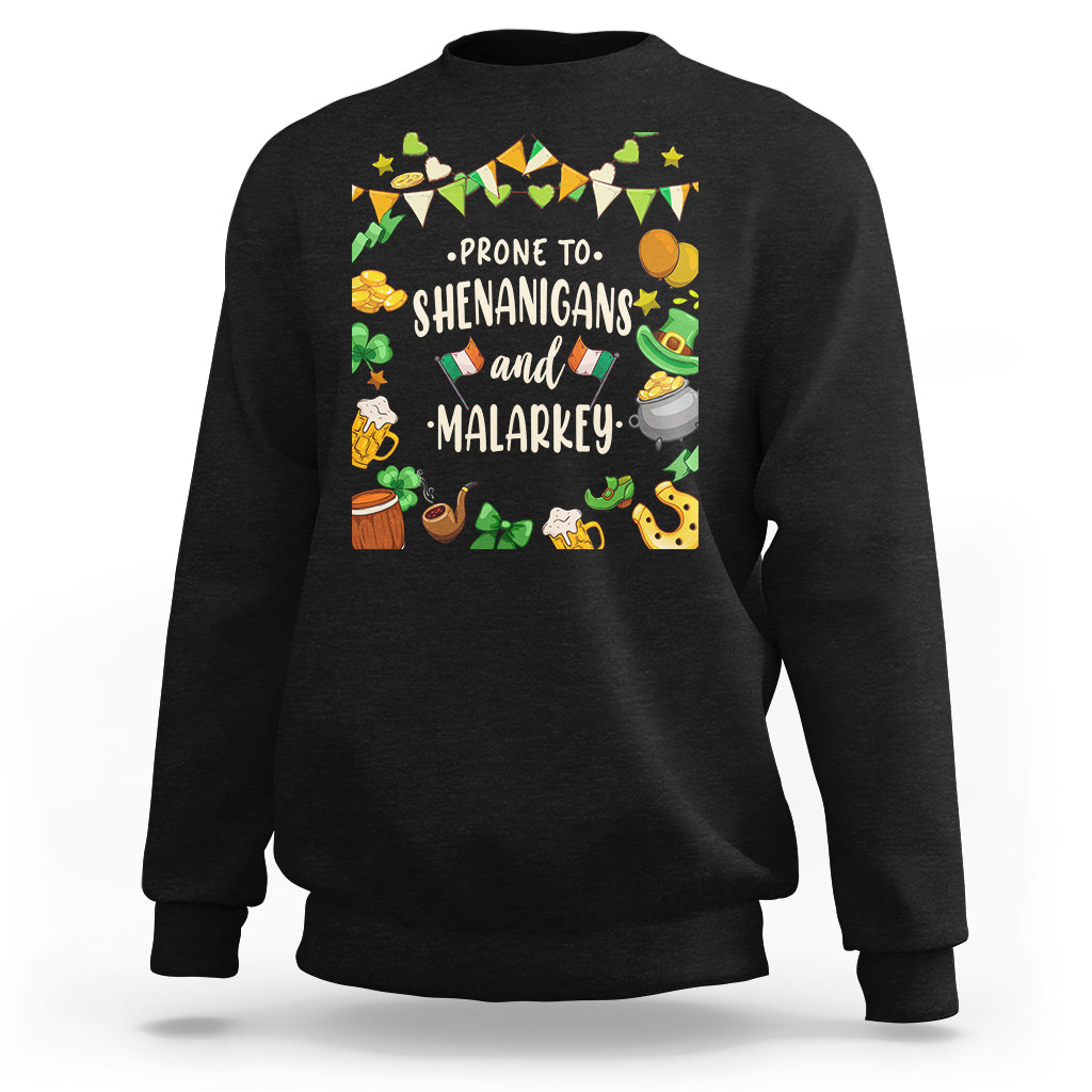 Black crewneck sweatshirt with leprechaun-themed graphic and bold 'SHENANIGANS' text