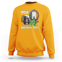 Gold crewneck sweatshirt with beer mug, barrel, and clover graphic