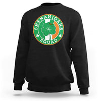 Black sweatshirt with round “Shenanigans Squad” graphic featuring clover and hat