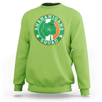 Lime green sweatshirt with round “Shenanigans Squad” graphic featuring clover and hat