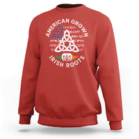 Red sweatshirt with Celtic knot and Irish flag “Irish Roots” graphic