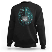 Black crewneck sweatshirt with turquoise autism awareness brain-circuit graphic on chest
