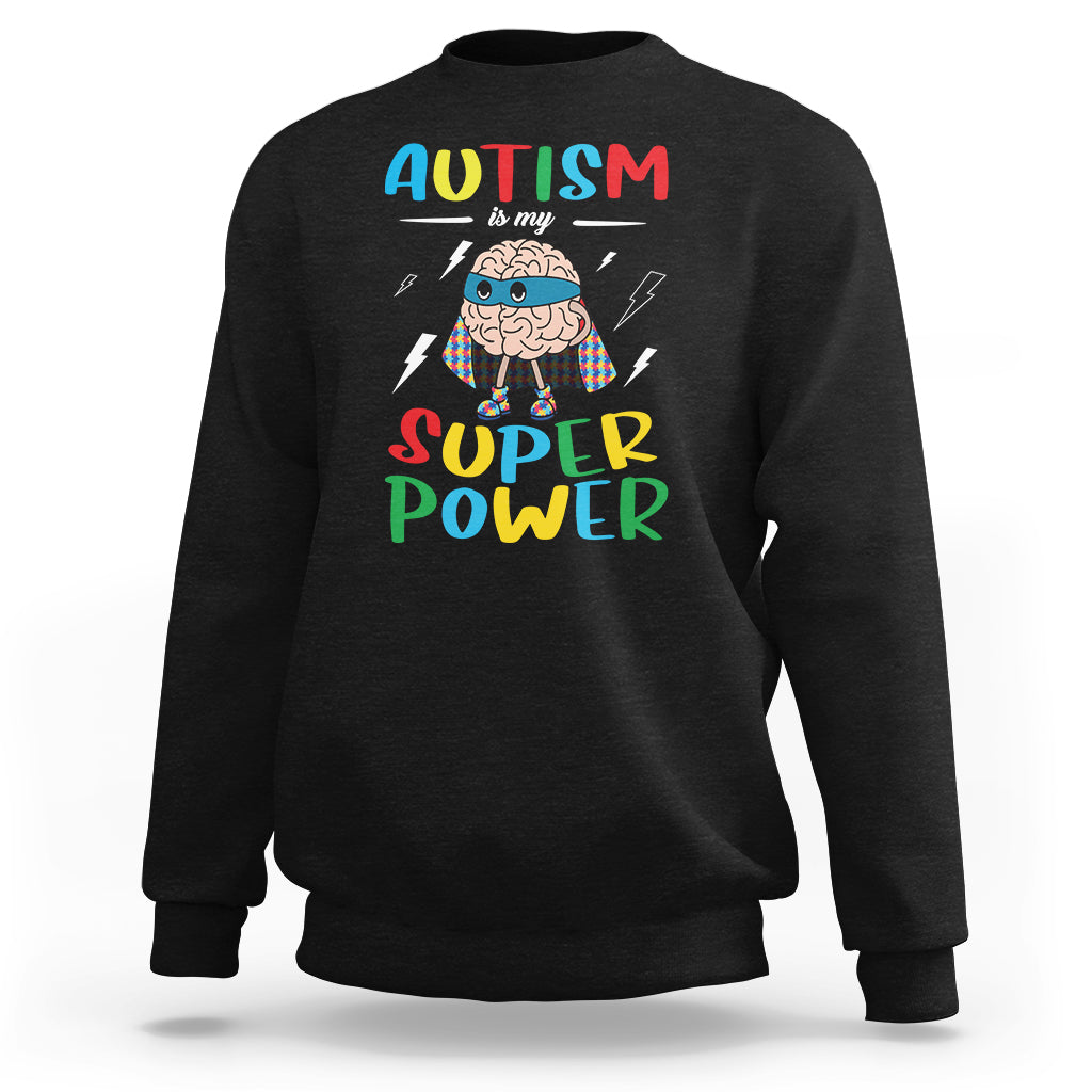 Black crewneck sweatshirt with colorful “AUTISM is my SUPER Power” front graphic
