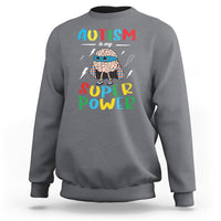 Charcoal gray crewneck sweatshirt with colorful “AUTISM is my SUPER Power” front graphic