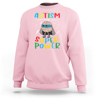 Light pink crewneck sweatshirt with colorful “AUTISM is my SUPER Power” front graphic