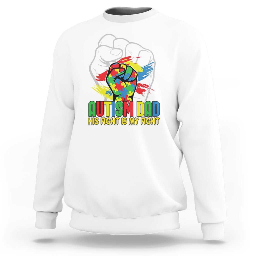 White crewneck sweatshirt with Autism Dad heart graphic and bold green text.