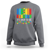 Charcoal sweatshirt with rainbow bunny graphic and 'It's OK to be Different' text