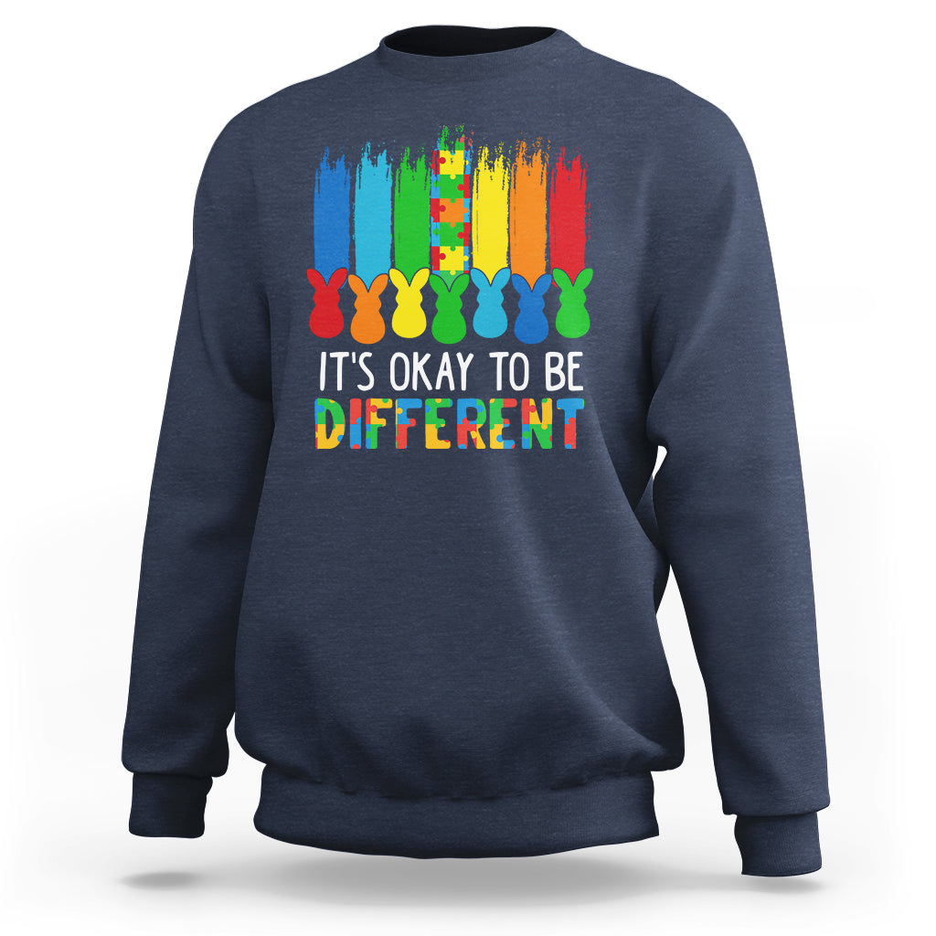 Navy sweatshirt with rainbow bunny graphic and 'It's OK to be Different' text