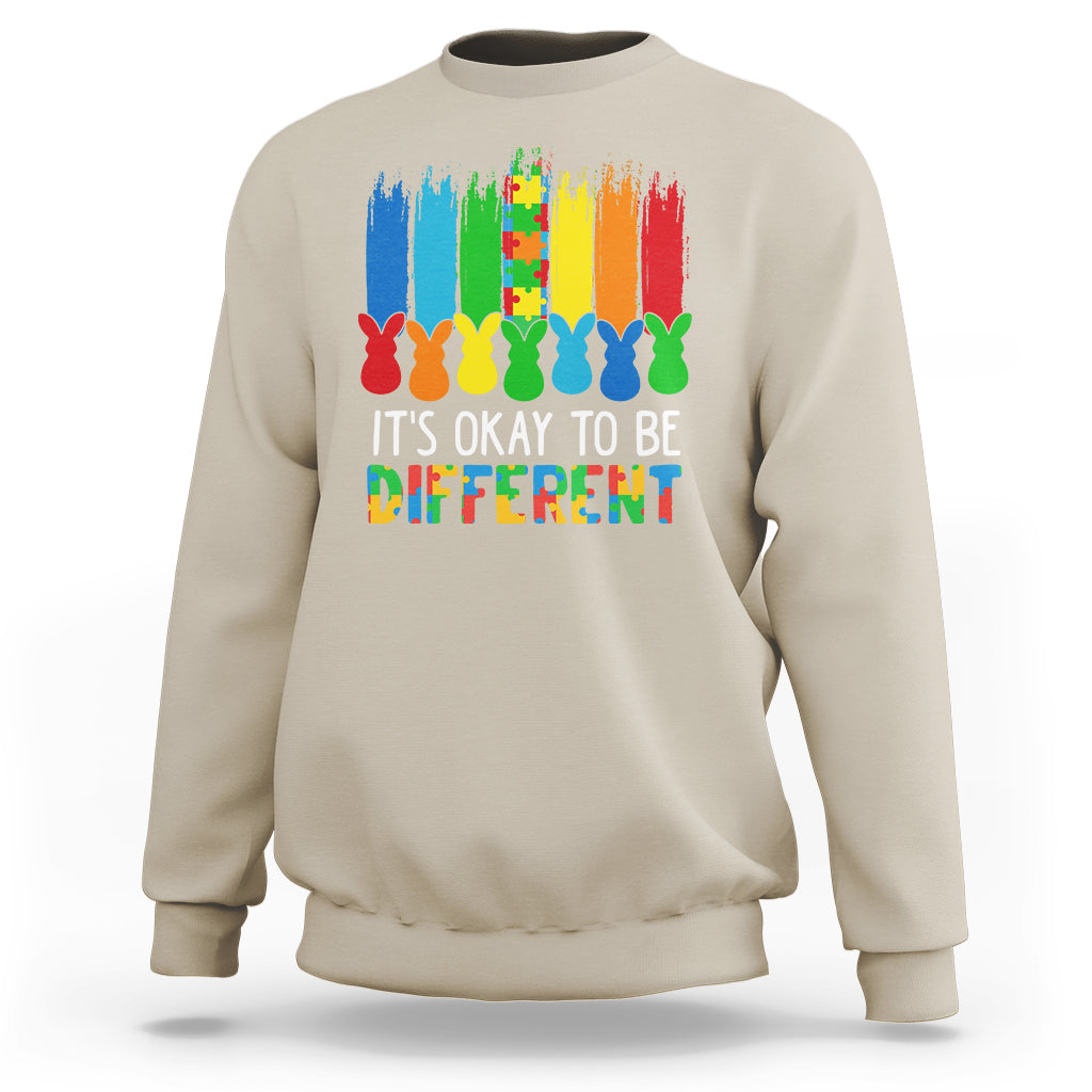 Sand sweatshirt with rainbow bunny graphic and 'It's OK to be Different' text