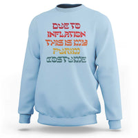 Light blue crewneck sweatshirt with colorful Hebrew-style text graphic on the chest