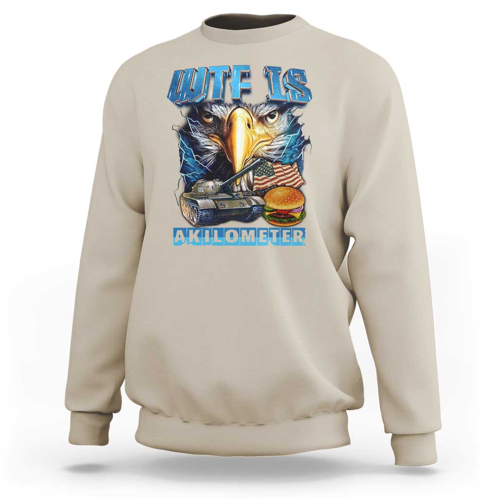 Beige crewneck sweatshirt with eagle head, American flag, and AKILOMETER graphic