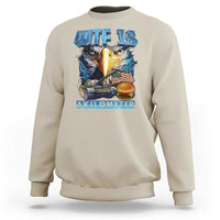 Beige crewneck sweatshirt with eagle head, American flag, and AKILOMETER graphic