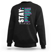 Dark charcoal sweatshirt with colorful semicolon awareness graphic on back