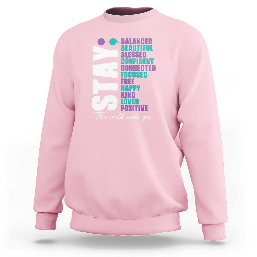 Light pink sweatshirt with colorful semicolon awareness graphic on back