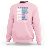 Light pink sweatshirt with colorful semicolon awareness graphic on back