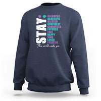 Navy sweatshirt with colorful semicolon awareness graphic on back