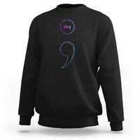 Black crewneck sweatshirt with front awareness graphic, teal arc text and pink heart detail