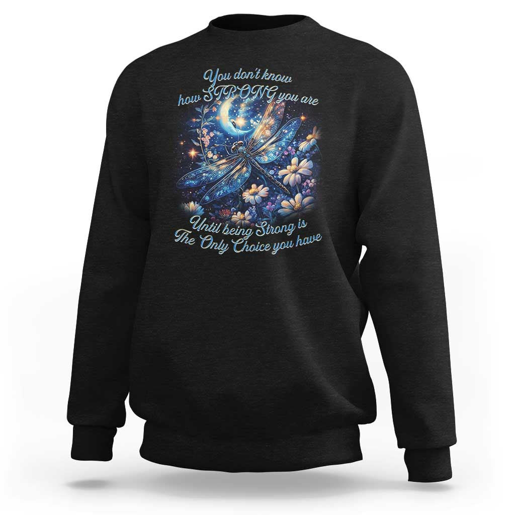 Black crewneck sweatshirt with moon-and-butterfly graphic and front text