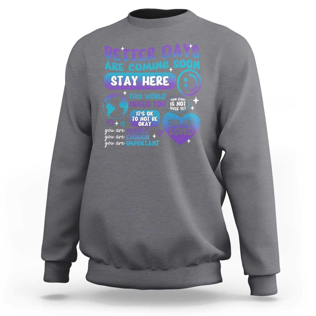 Charcoal unisex sweatshirt with “Stay Here” suicide prevention message graphic on front