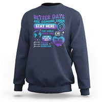 Navy unisex sweatshirt with “Stay Here” suicide prevention message graphic on front