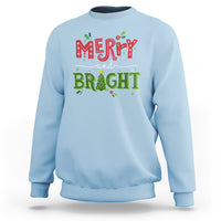 Light blue crewneck sweatshirt with 'Merry and Bright' holiday graphic