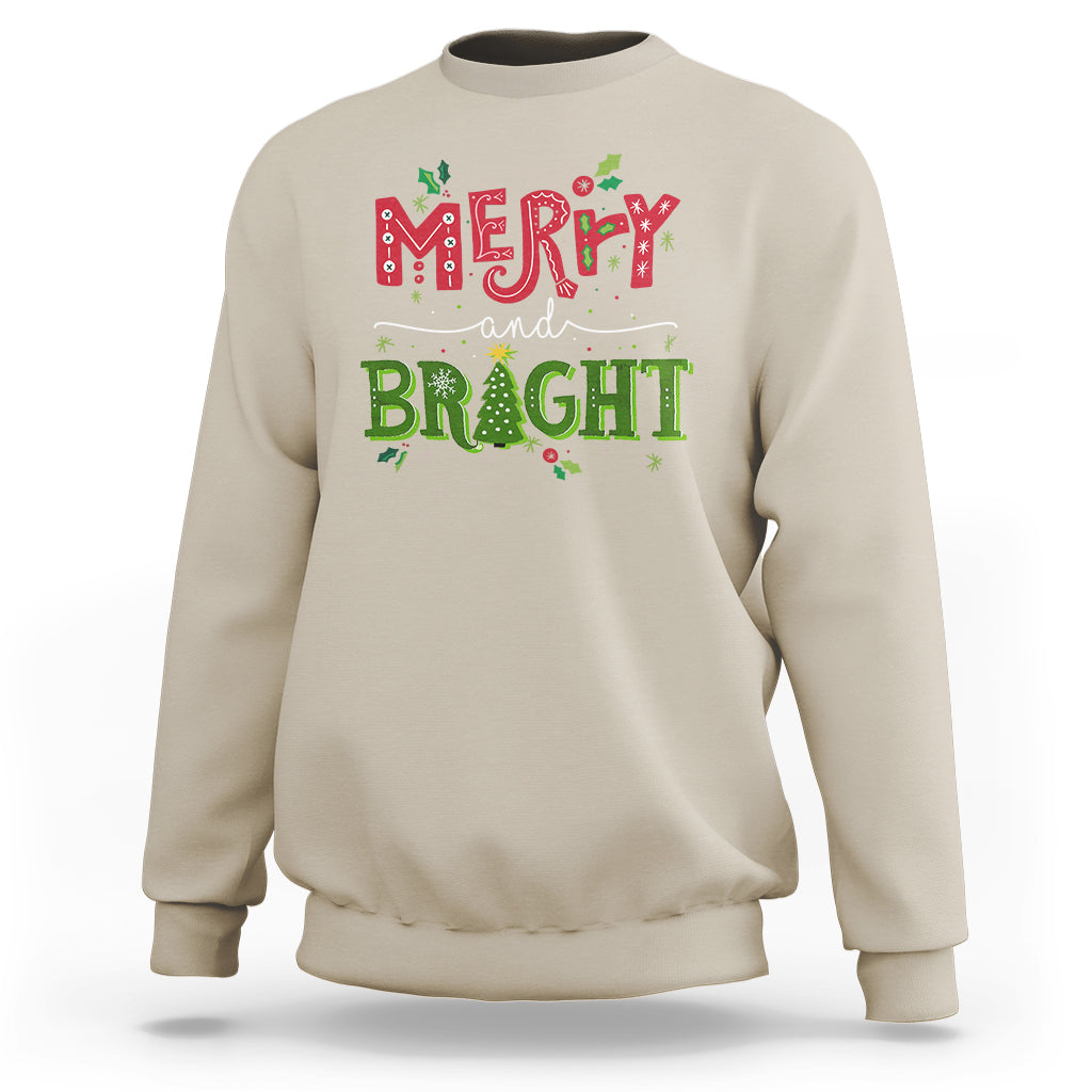 Sand crewneck sweatshirt with 'Merry and Bright' holiday graphic