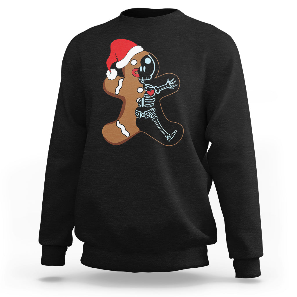 Black sweatshirt with cartoon gingerbread character and skeleton nurse graphic on chest