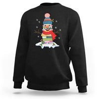 Black Christmas sweatshirt with cartoon snowman wearing a colorful winter hat