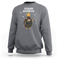 Charcoal crewneck sweatshirt with “BAAAH HUMBUG” sheep holding Christmas lights graphic