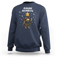 Navy crewneck sweatshirt with “BAAAH HUMBUG” sheep holding Christmas lights graphic