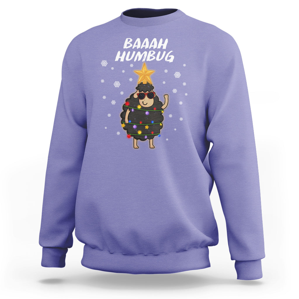 Lavender crewneck sweatshirt with “BAAAH HUMBUG” sheep holding Christmas lights graphic